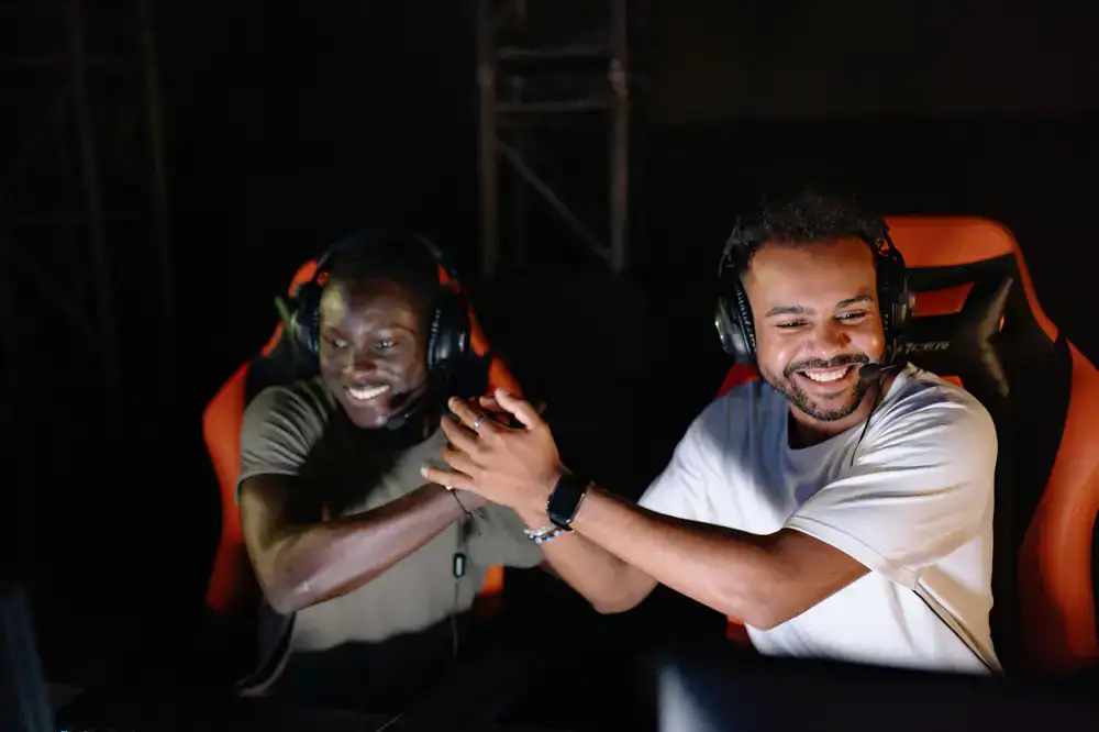 Player support staff assisting a team at a gaming event