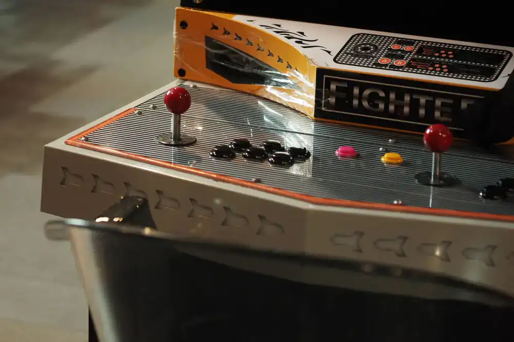 Close up of arcade fighting game controller