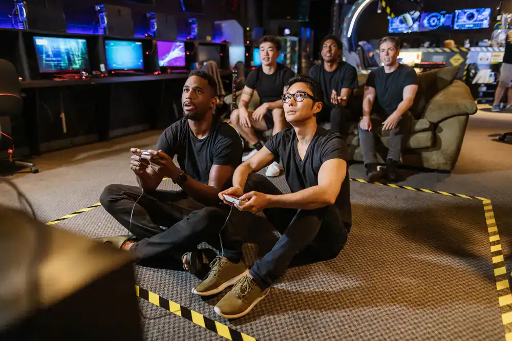 Competitors focused on screens at a live gaming event