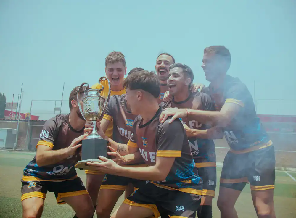 Players lifting the circuit trophy